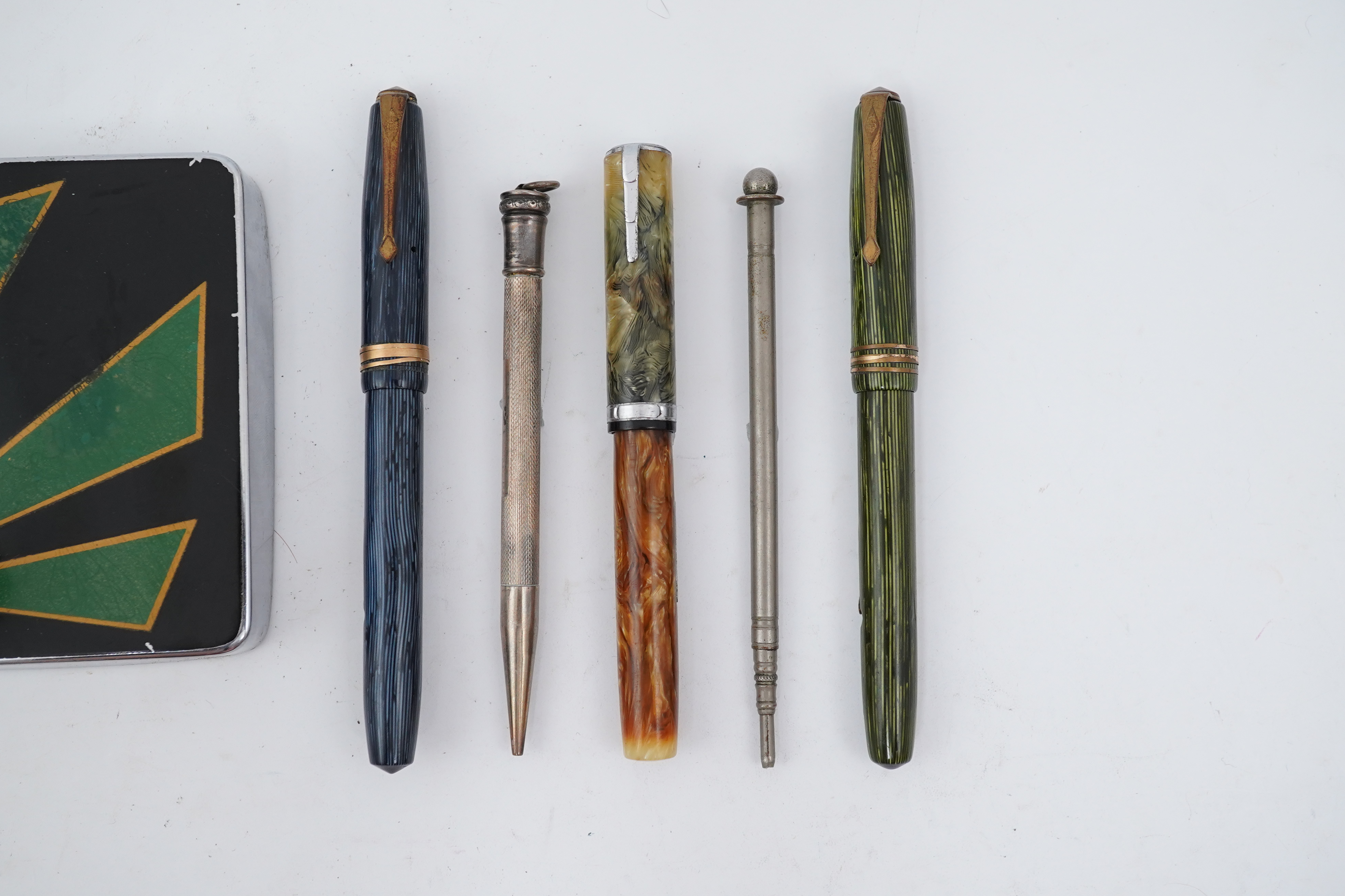 A Parker 'Art Deco' desk/pen base plus Waterman Lady Patricia and Conway Stewart Pens, etc.